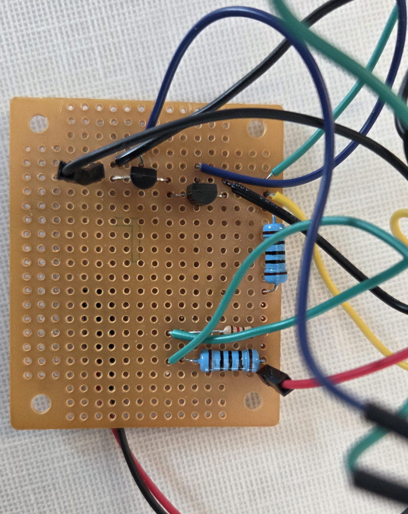 The NAND gate circuit described above, on a physical circuit board.
